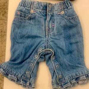 3 pairs of baby girl jeans with snap closure 0-3 mos. Never worn